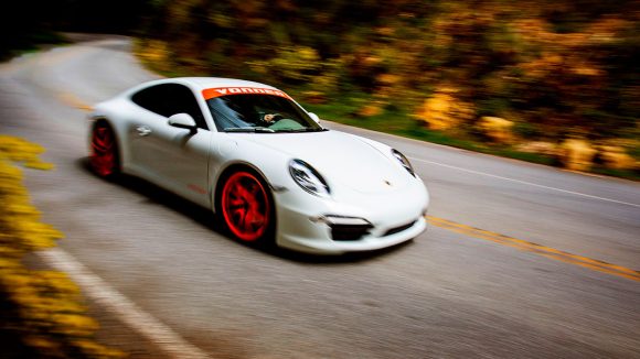Vonnen Shadow Drive Porsche driving on a winding road